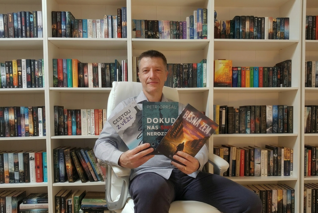 Petr Oprsal with Books in Library - Photo 2